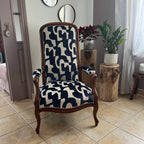 Réfection traditionnelle d’un fauteuil Voltaire