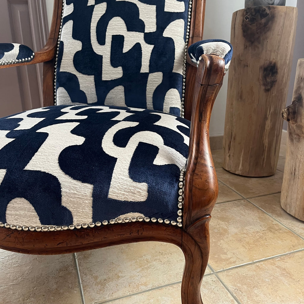Réfection traditionnelle d’un fauteuil Voltaire