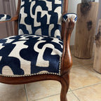 Réfection traditionnelle d’un fauteuil Voltaire